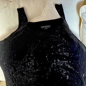 Beautiful sleeveless top with sewn on sequins on front. Lane Bryant size 14/16.